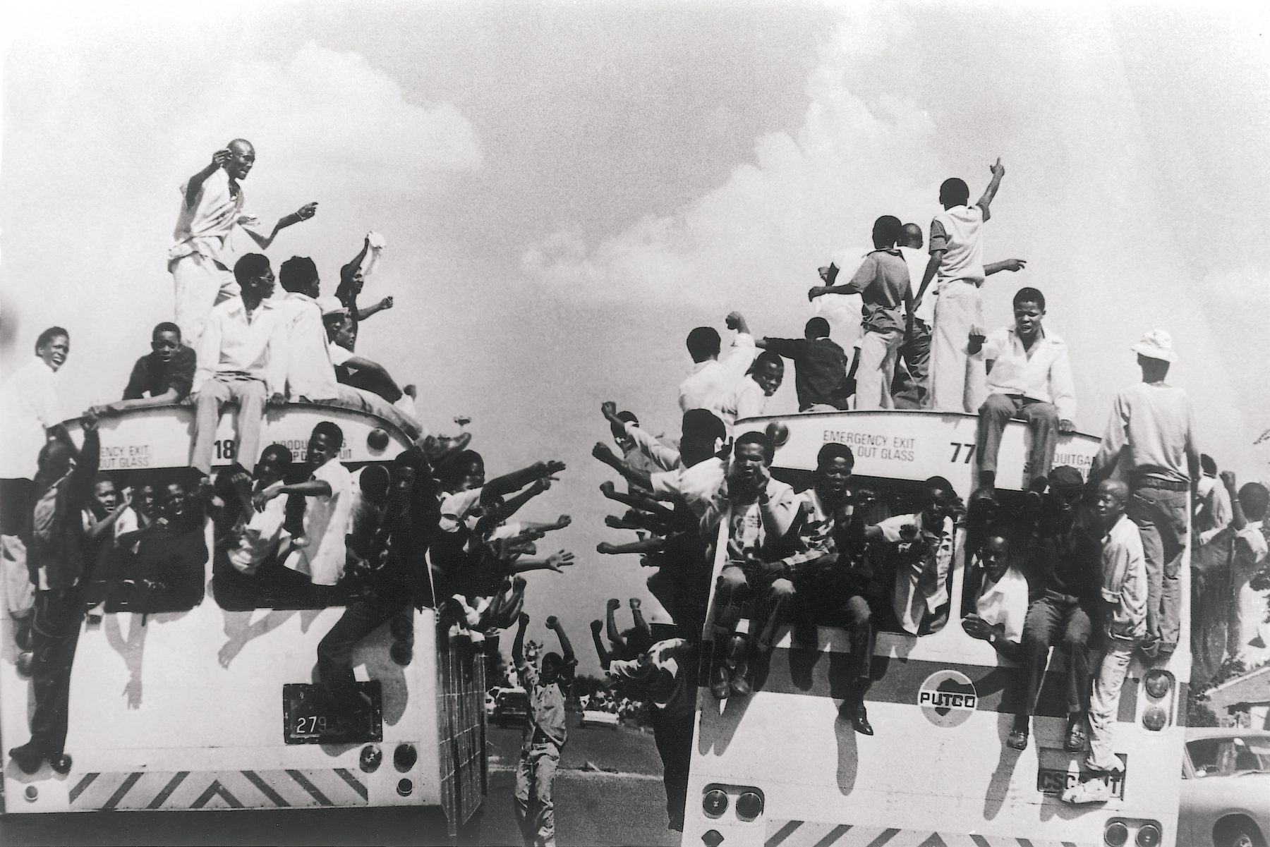 Students hanging from buses on the way to funerals and demonstrations, late 1970s.